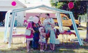 Ann Perkins and her granddaughters in front of Loriann's Egg Rolls.